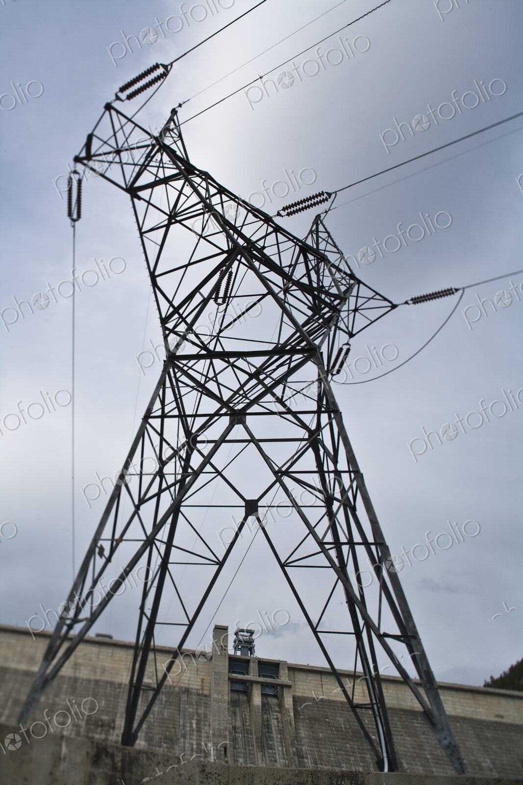 Low Angle View Of High Voltage Tower