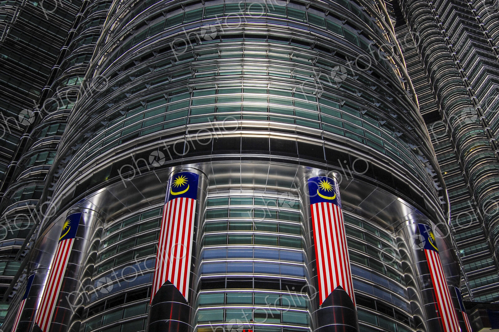 Low angle close up of the exterior of the Petronas Towers, Kuala Lumpur.