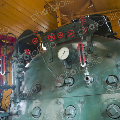 Low angle exterior of a locomotive train.