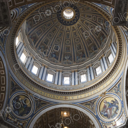 Low angle interior view of the dome of St. Peter's Basilica in Vatican City, Rome. Low angle interior view of the dome of St. Peter's Basilica in Vatican City, Rome.