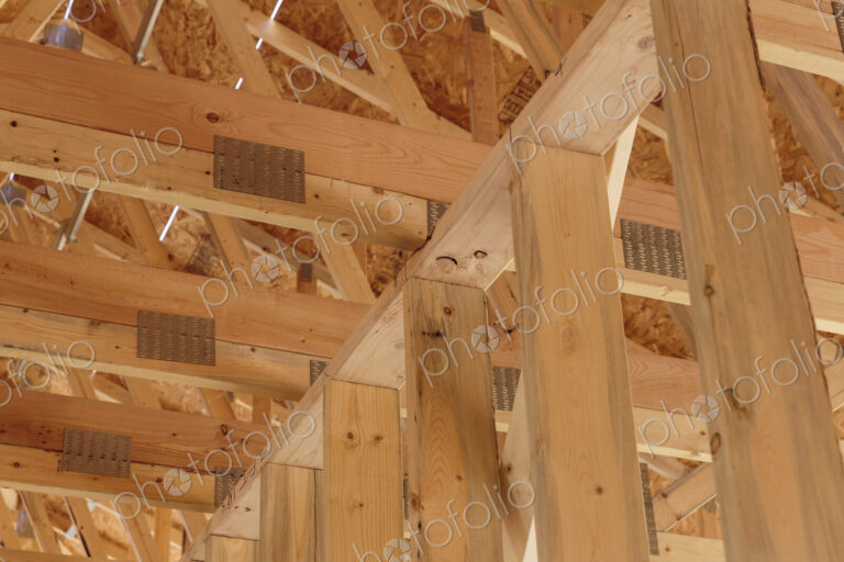 Low angle view of ceiling beams in new house