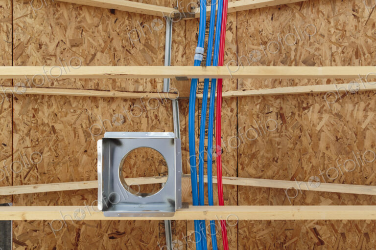 Low angle view of ceiling beams in new house