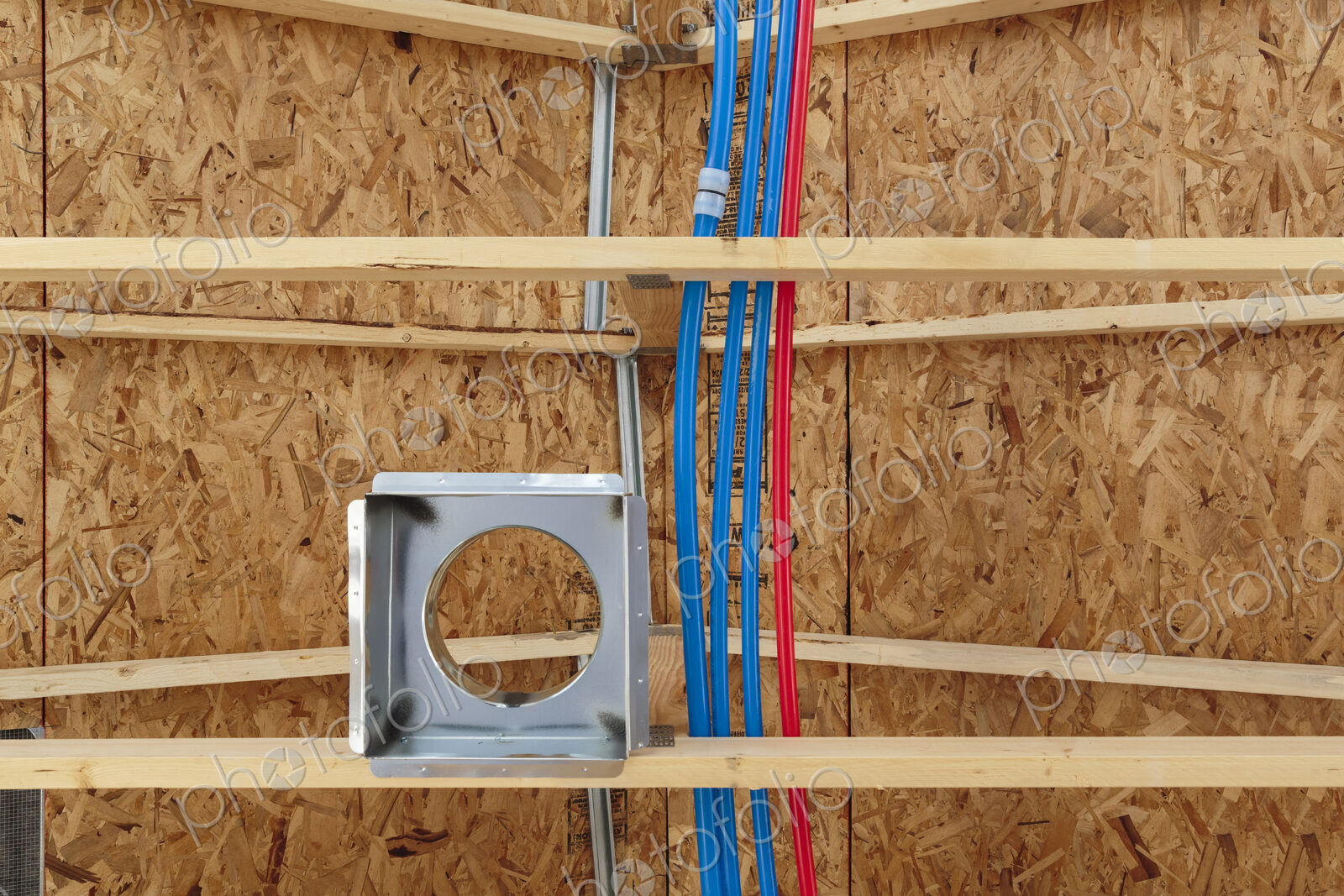 Low angle view of ceiling beams in new house