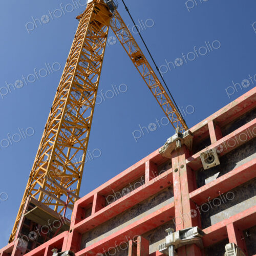 Low angle view of crane at construction site