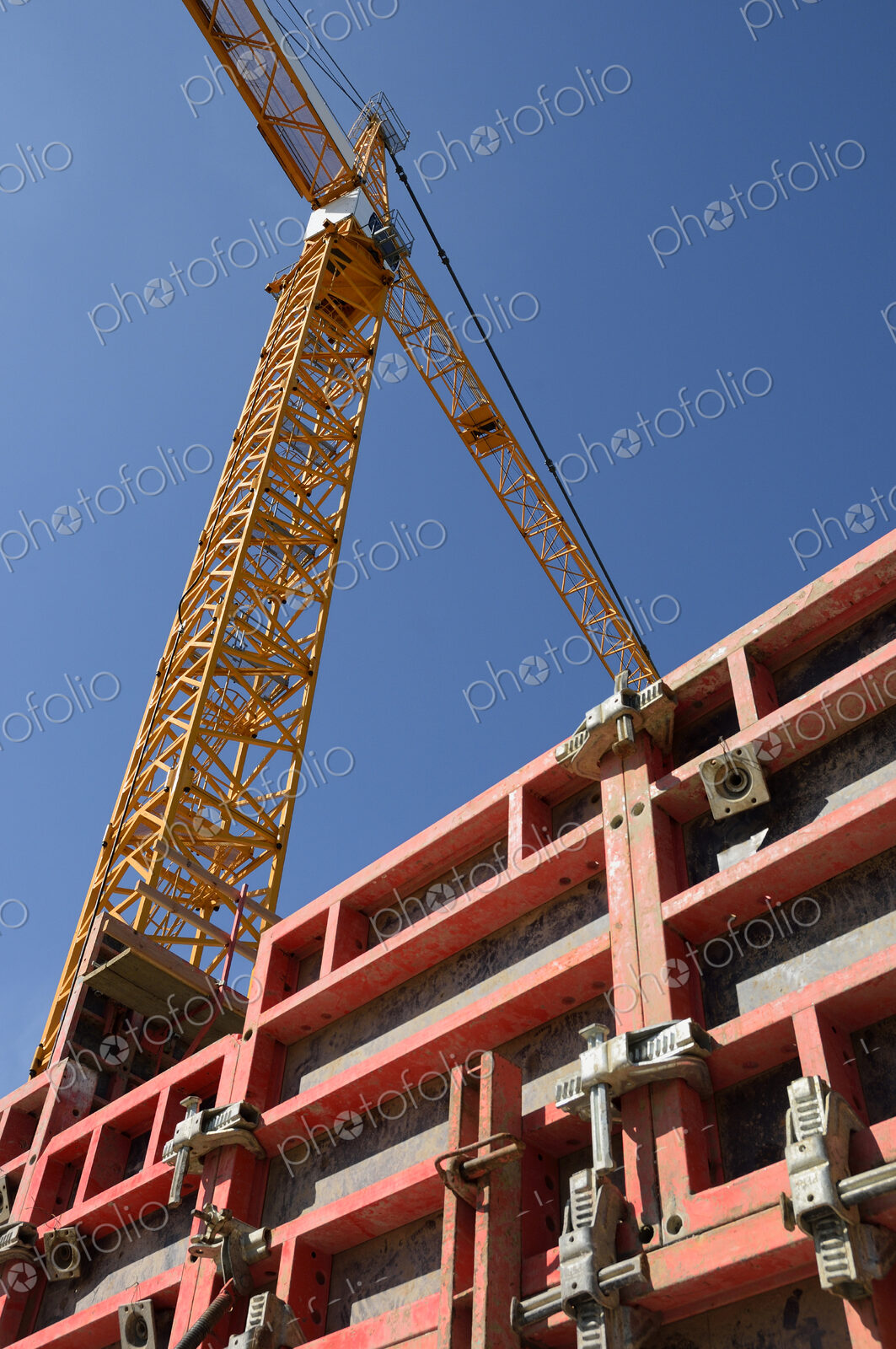 Low angle view of crane at construction site