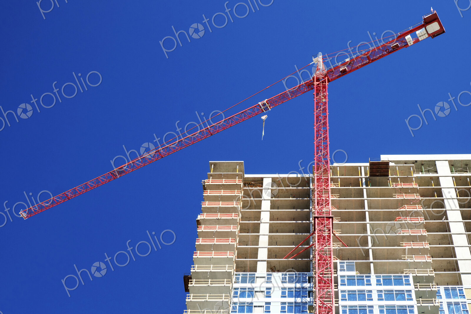 Low angle view of crane building highrise