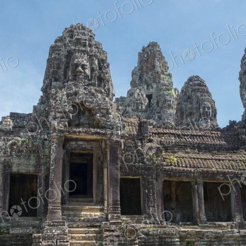 Low angle view of ornate carvings on Prasat Bayon temple, Angkor, Siem Reap, Cambodia Low angle view of ornate carvings on Prasat Bayon temple, Angkor, Siem Reap, Cambodia