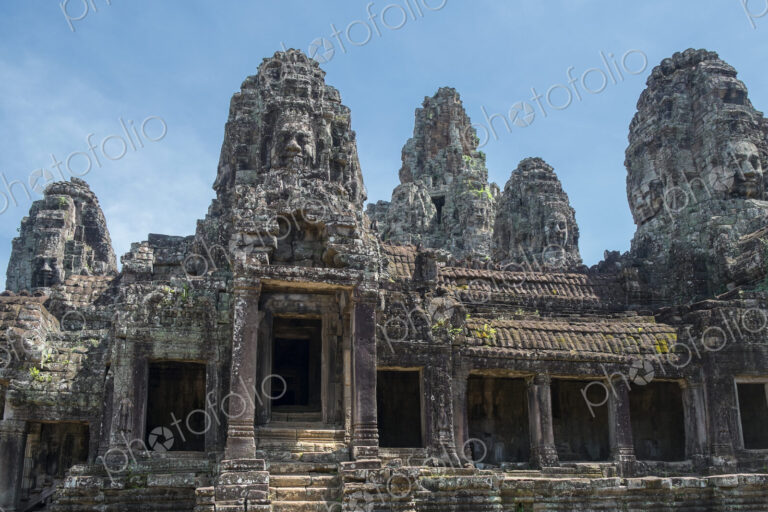 Low angle view of ornate carvings on Prasat Bayon temple, Angkor, Siem Reap, Cambodia