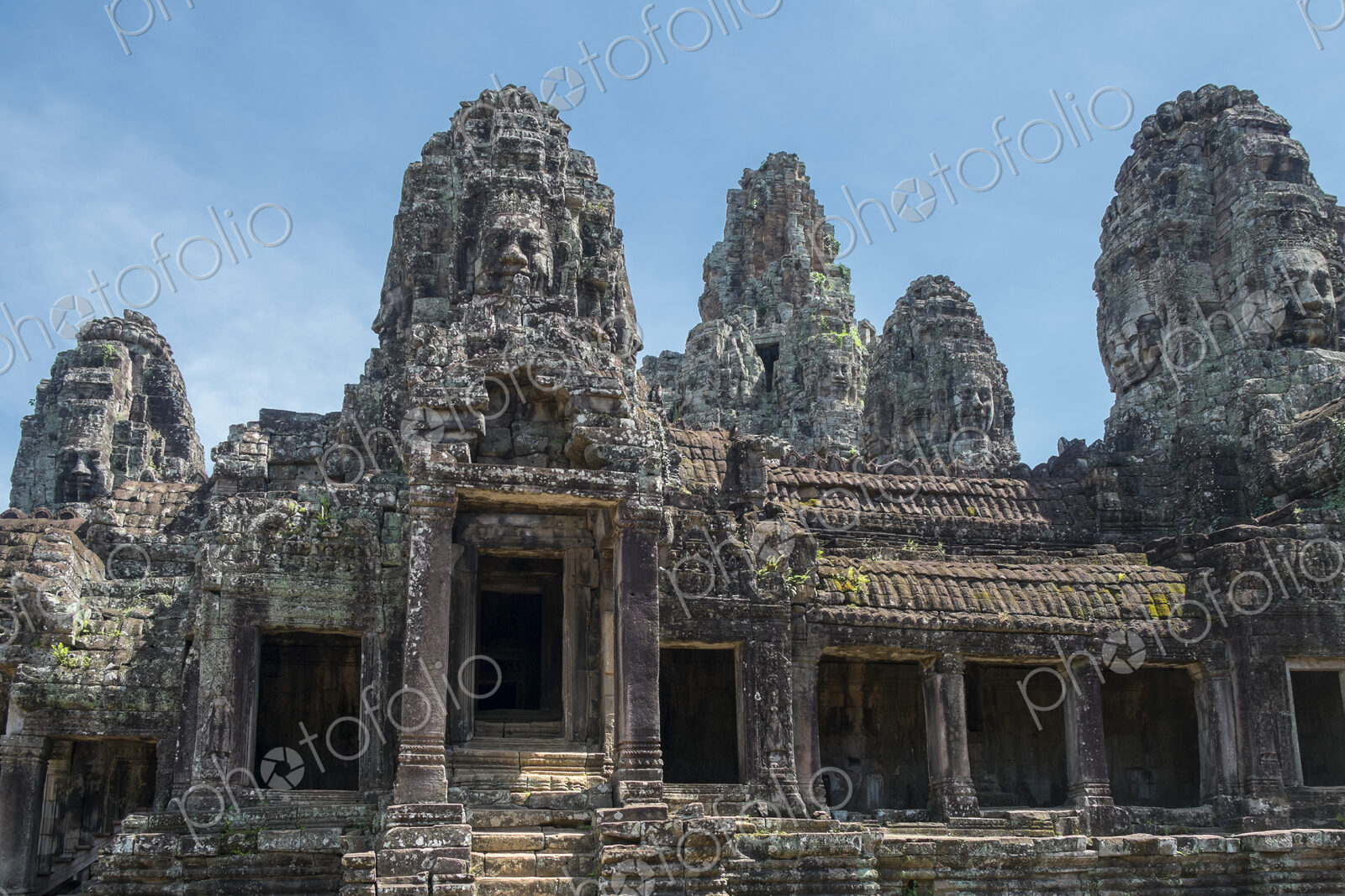 Low angle view of ornate carvings on Prasat Bayon temple, Angkor, Siem Reap, Cambodia