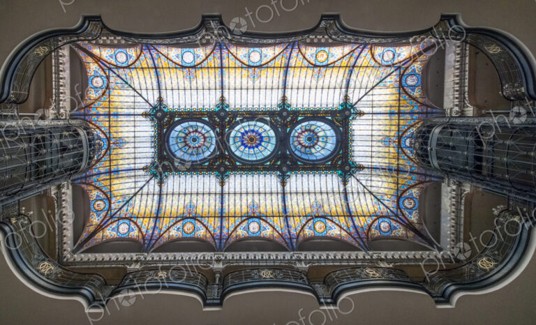 Low angle view of stained glass ceiling in a hotel