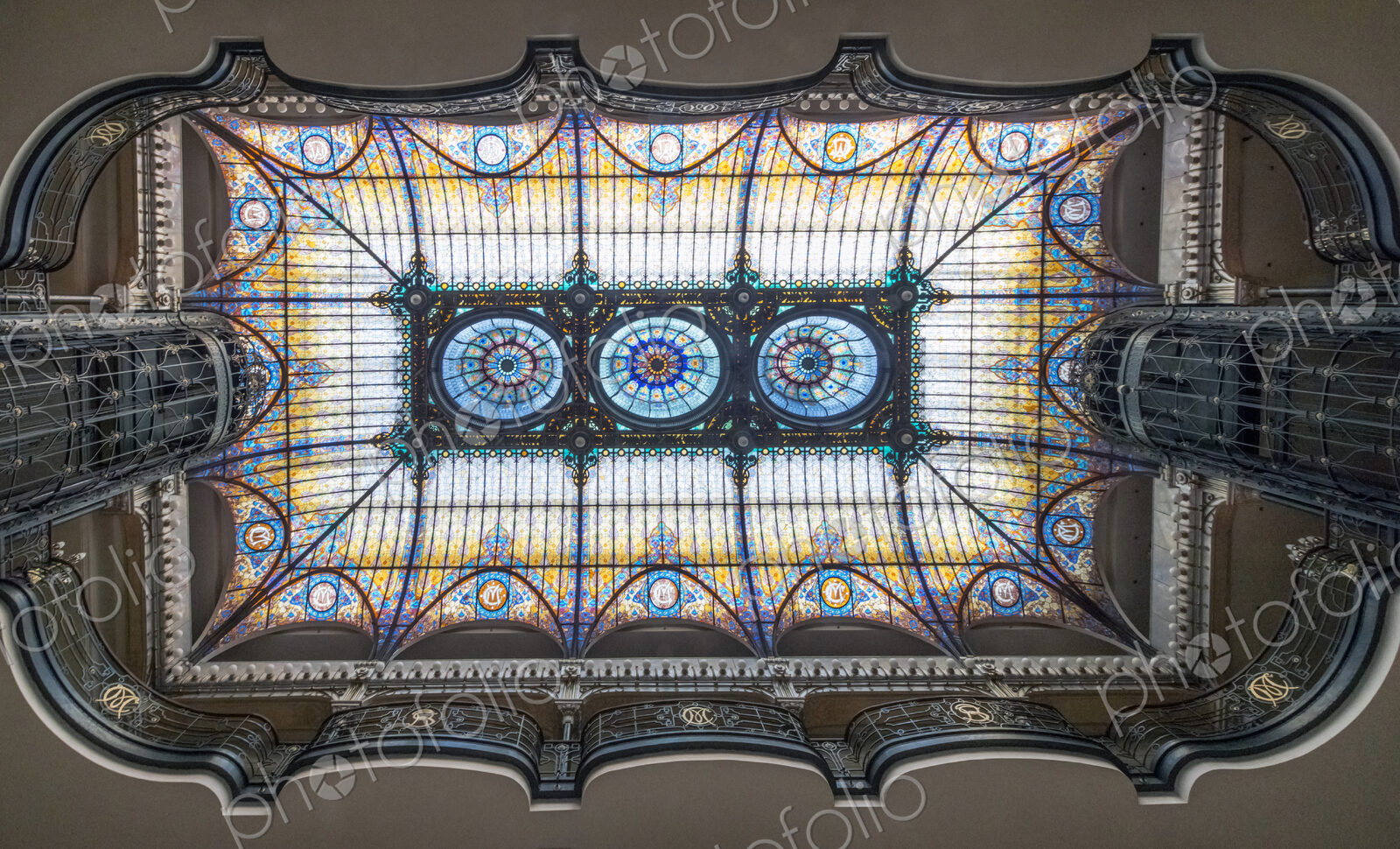 Low angle view of stained glass ceiling in a hotel