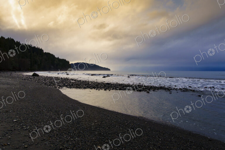 Low tide wilderness beach on the Strait of Juan de Fuca, Port Angeles, WA USA