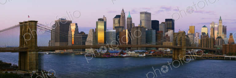 Lower Manhattan Skyline and Brooklyn Bridge at Dawn