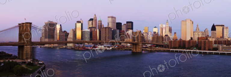 Lower Manhattan Skyline and Brooklyn Bridge at Dawn