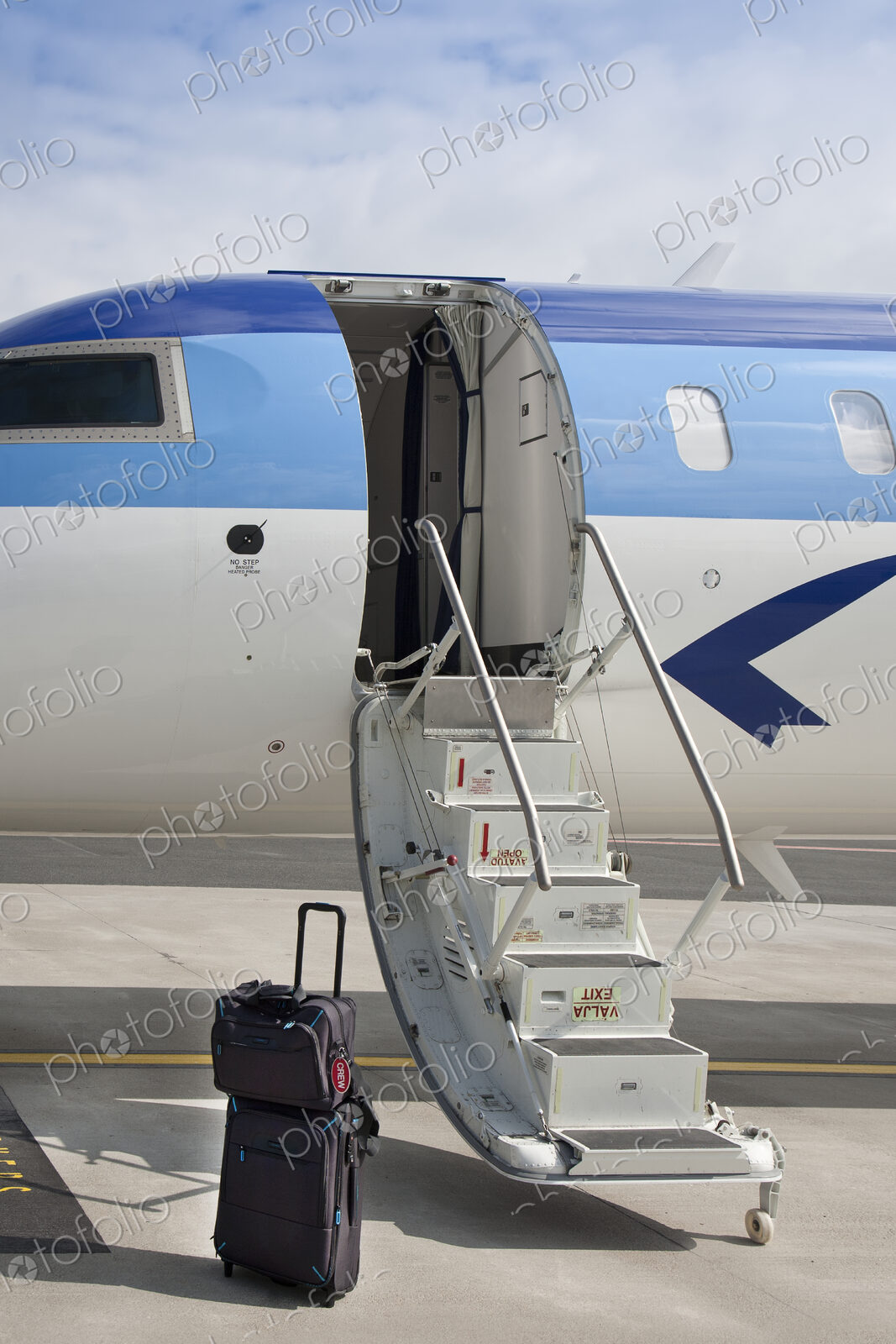 Luggage Near Airplane Steps