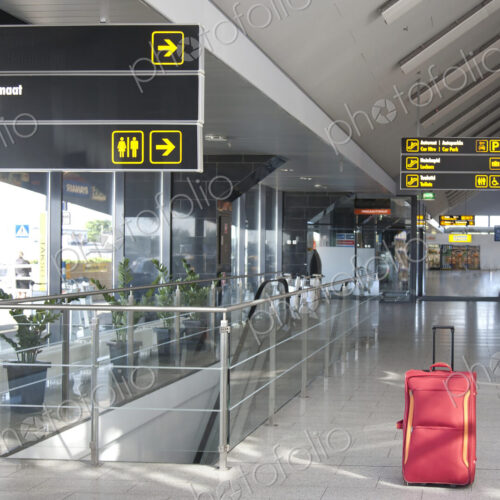 Luggage Sitting Alone in an Airport Terminal Luggage Sitting Alone in an Airport Terminal