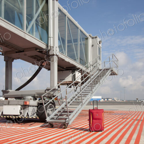 Luggage at a Gate Bridge Luggage at a Gate Bridge