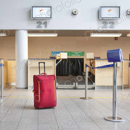 Luggage at an Airline Check-In Counter