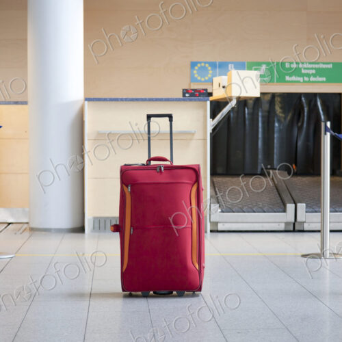 Luggage at an Airline Check-In Counter