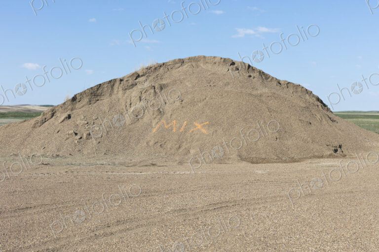 "MIX" spray painted on gravel pile, near Scotsguard, Saskatchewan, Canada.