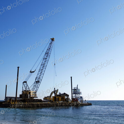 Machinery Cleaning Up a Pier Machinery Cleaning Up a Pier