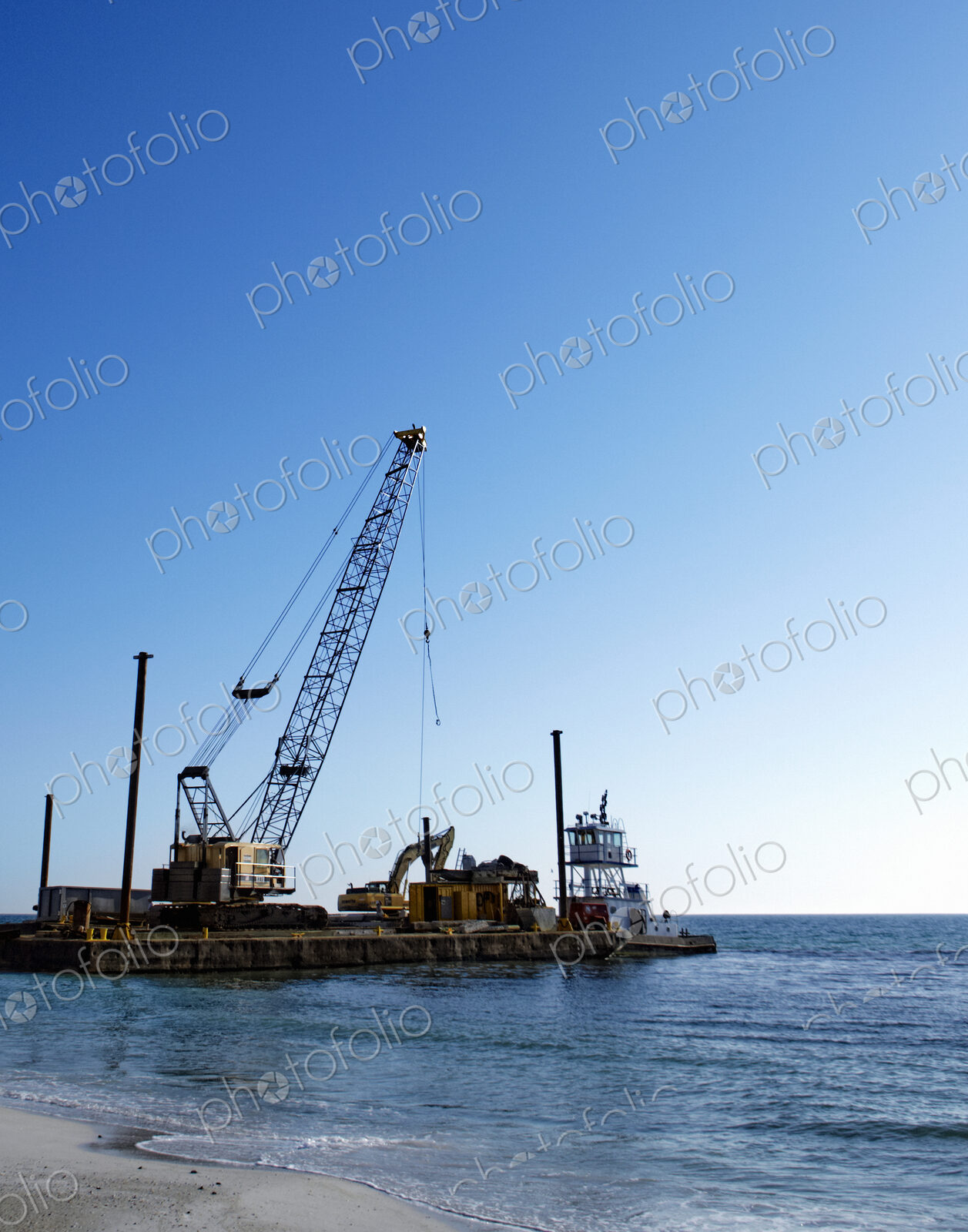Machinery Cleaning Up a Pier
