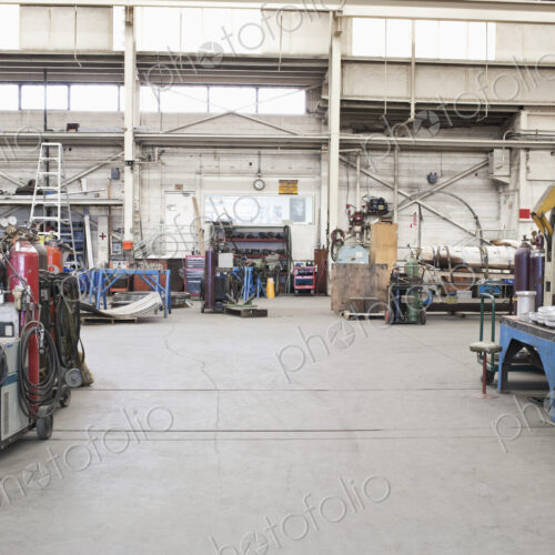 Machinery in repair shop warehouse.