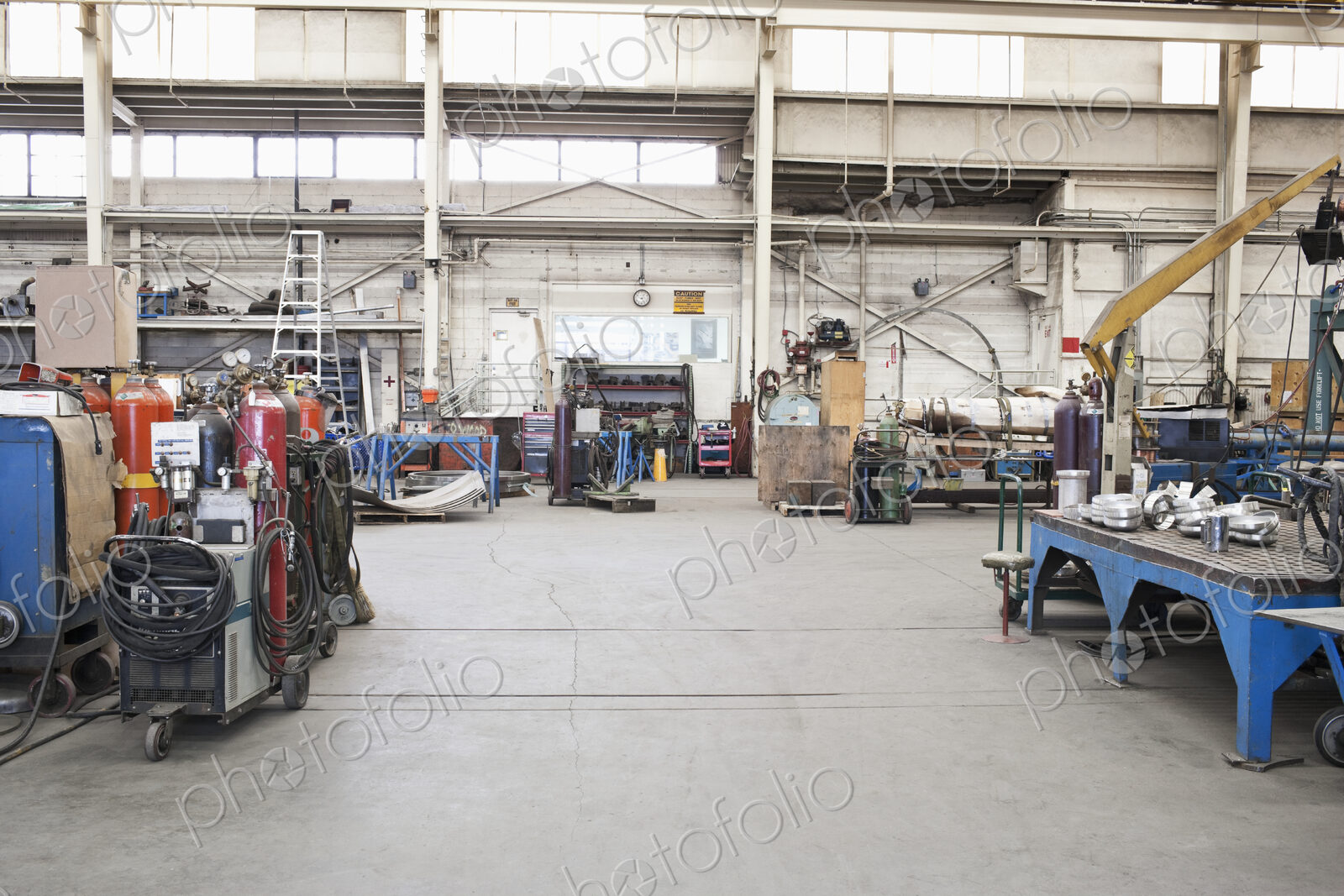 Machinery in repair shop warehouse.
