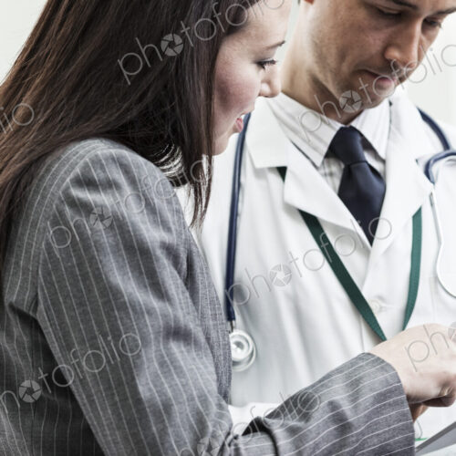 Man and woman doctors meeting to discuss a problem