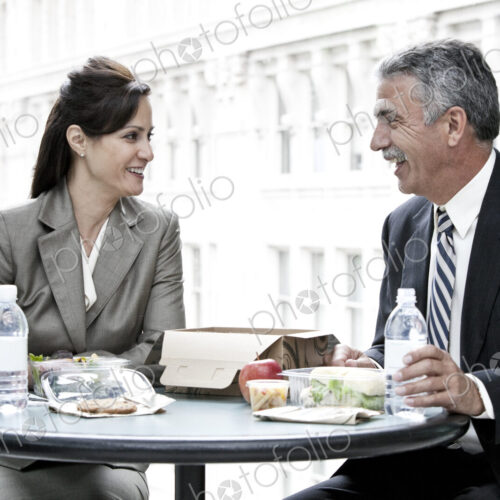 Man and woman having a business lunch Man and woman having a business lunch
