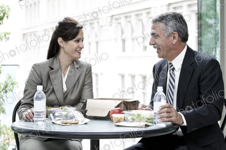 Man and woman having a business lunch