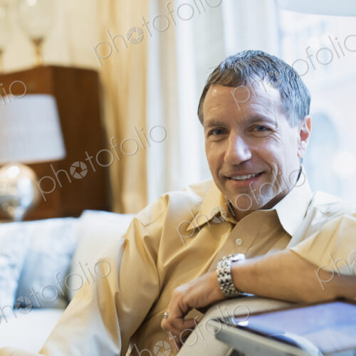 Man relaxing at home Man relaxing at home