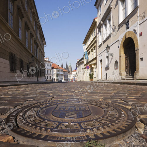 Manhole Cover on a Street in Hradcany Manhole Cover on a Street in Hradcany