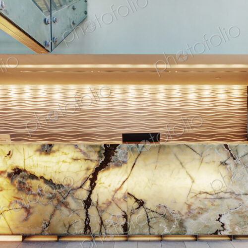 Marble reception desk in hotel lobby Marble reception desk in hotel lobby