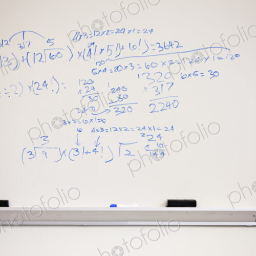 Math equations on whiteboard
