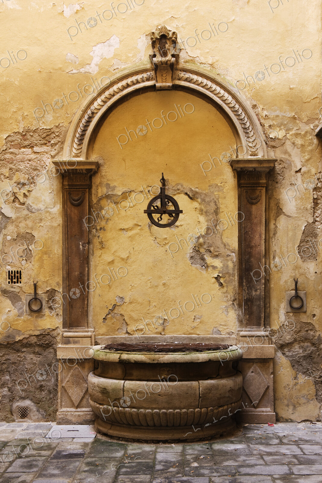 Medieval Well with Arched Detail