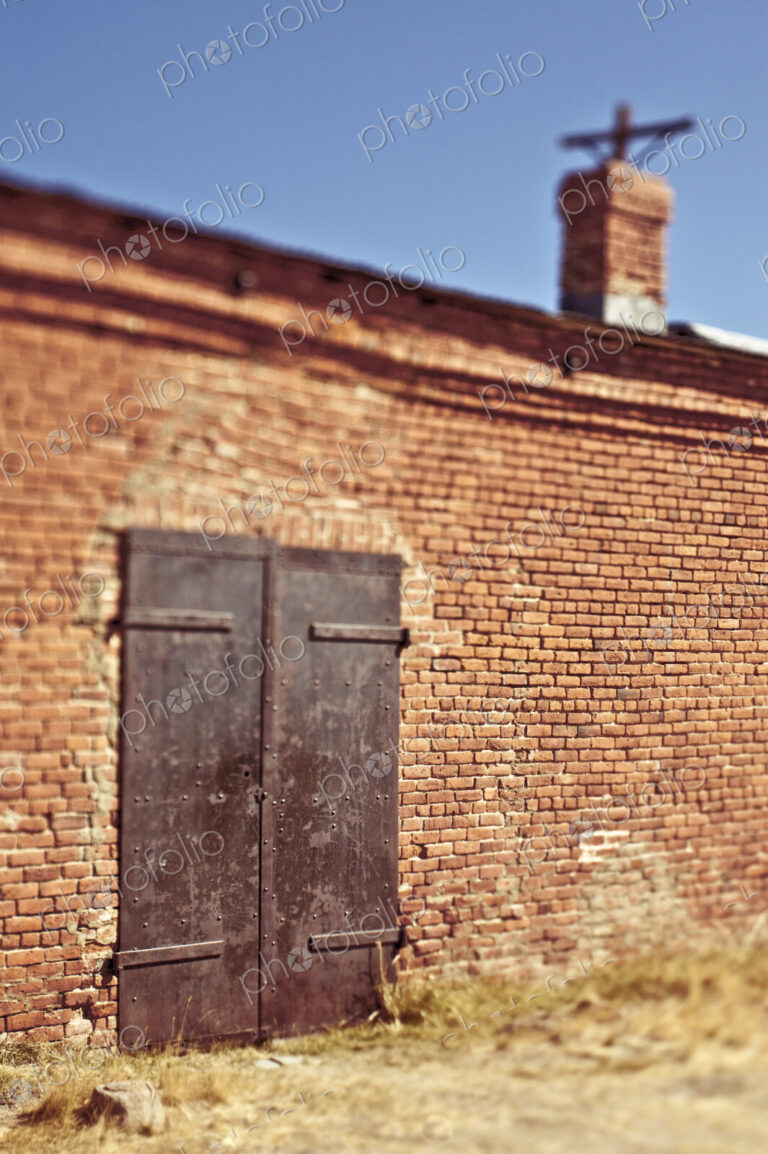 Metal Door in Brick Facade