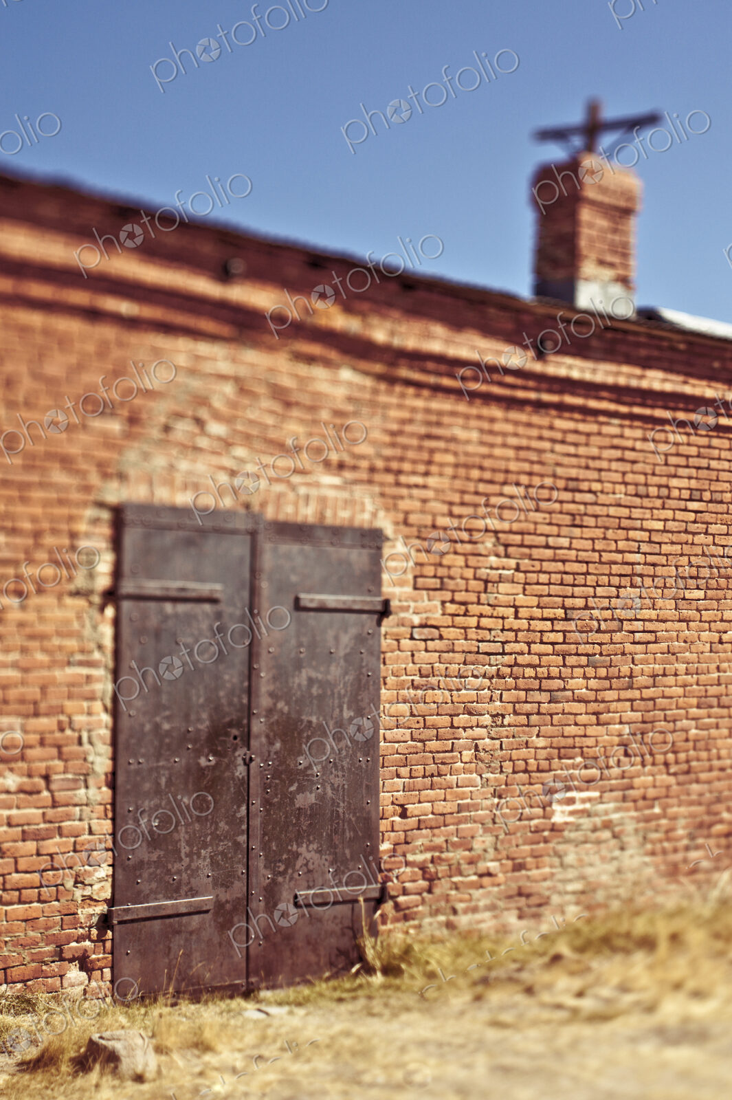 Metal Door in Brick Facade