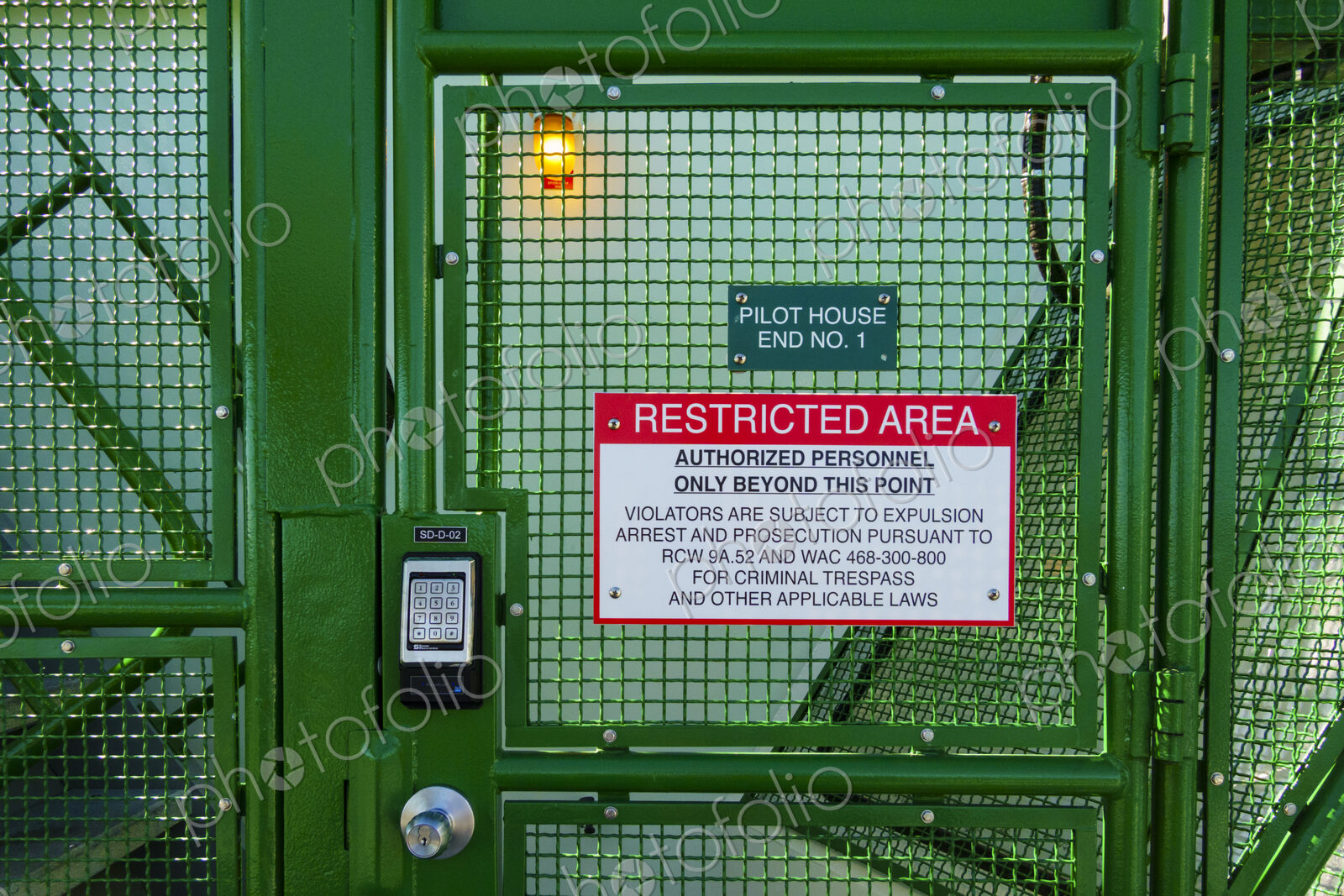 Metal locked gate on the dock by the Washington State Ferry