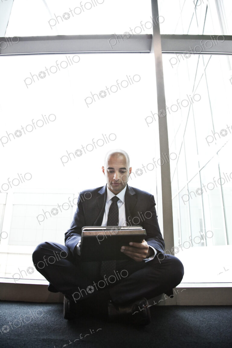 Middle eastern businessman working on a notebook computer