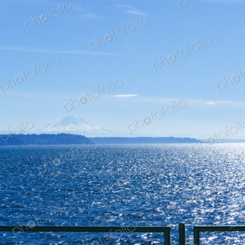 Middle of Puget Sound from a Puget Sound ferry in windy blue sky conditions, near… Middle of Puget Sound from a Puget Sound ferry in windy blue sky conditions, near…