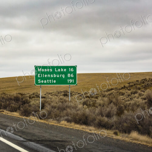 Mileage sign on Interstate 90. Mileage sign on Interstate 90.