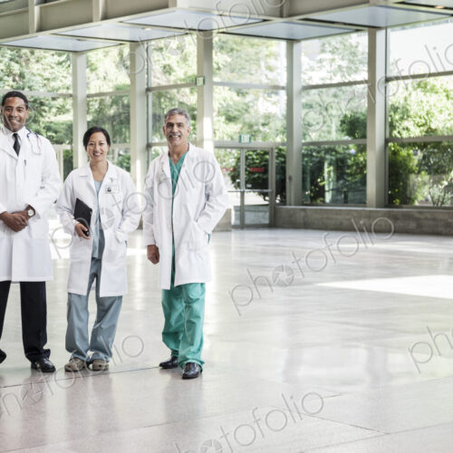 Mixed race group of doctors in lab coats. Mixed race group of doctors in lab coats.