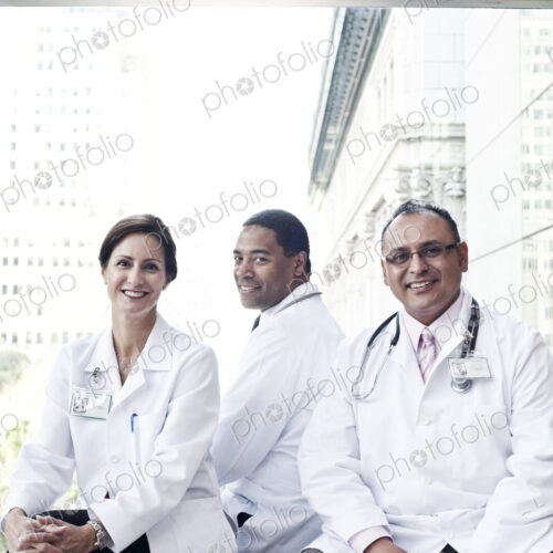 Mixed race group of doctors in lab coats. Mixed race group of doctors in lab coats.