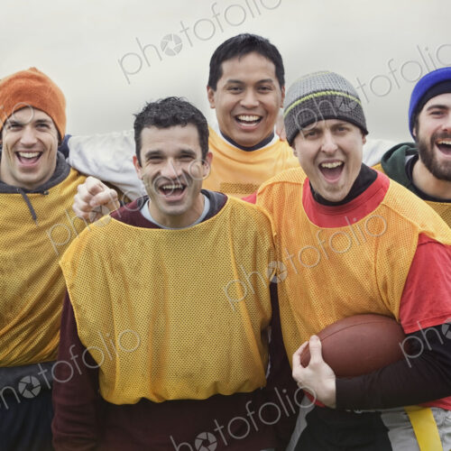 Mixed race group of men who play American Flag Football. Mixed race group of men who play American Flag Football.