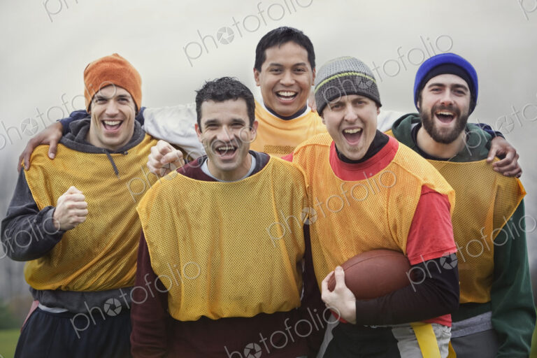Mixed race group of men who play American Flag Football.