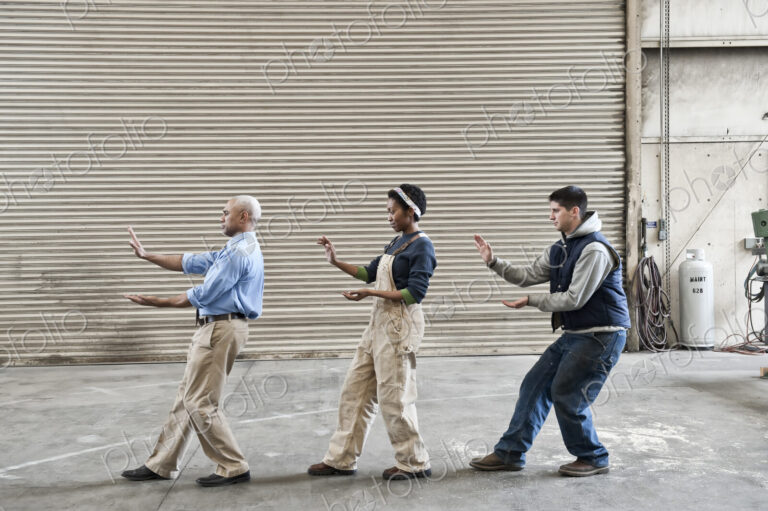 Mixed race group of workers and a black man management person taking a break on the…
