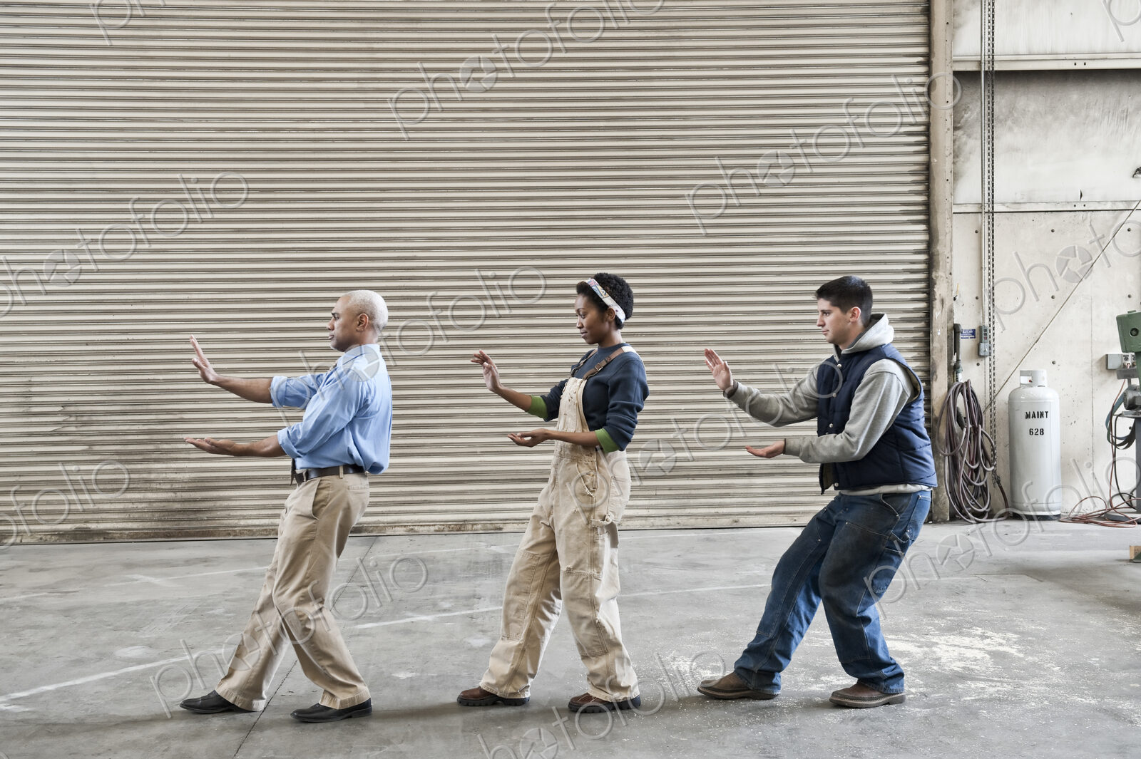 Mixed race group of workers and a black man management person taking a break on the…