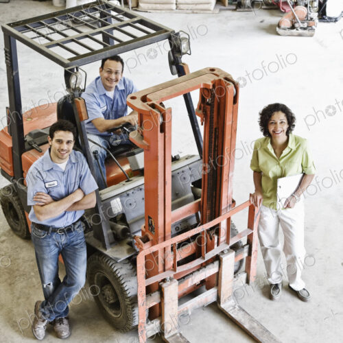 Mixed race team of workers and management person at a landscape company. Mixed race team of workers and management person at a landscape company.