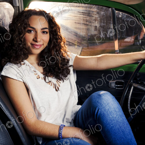 Mixed race woman driving car Mixed race woman driving car